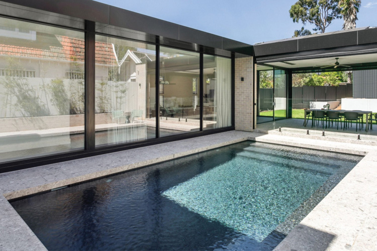 Family fibreglass pool with generous deck space Sydney